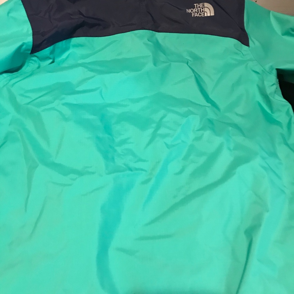 Boys size small The NorthFace rain jacket.